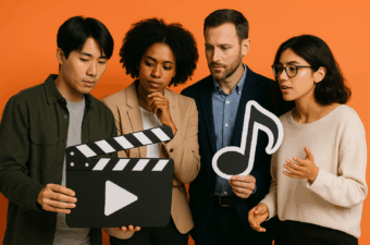 Quatro pessoas analisando um clipe de vídeo e música.