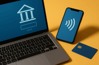 Computador e smartphone com ícones de bancos digitais