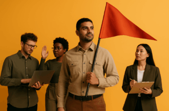 Grupo de indivíduos com um líder segurando uma bandeira vermelha.