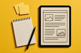 notebook e tablet sobre fundo amarelo